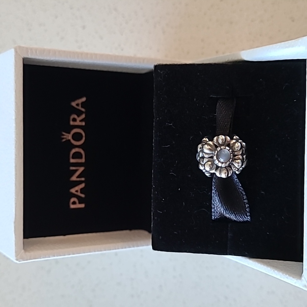 EUC Pandora retired moonstone flower charm